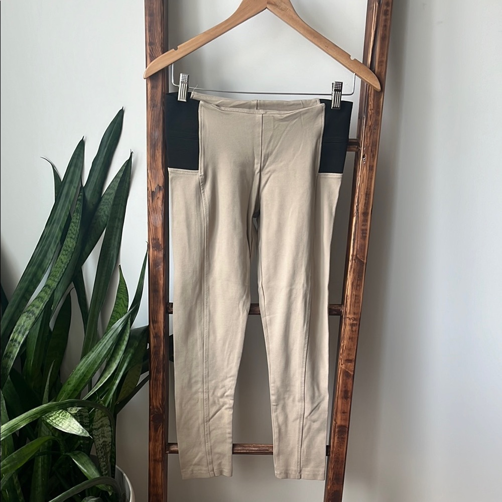Beige tight Pants with elastic Black Side Panels